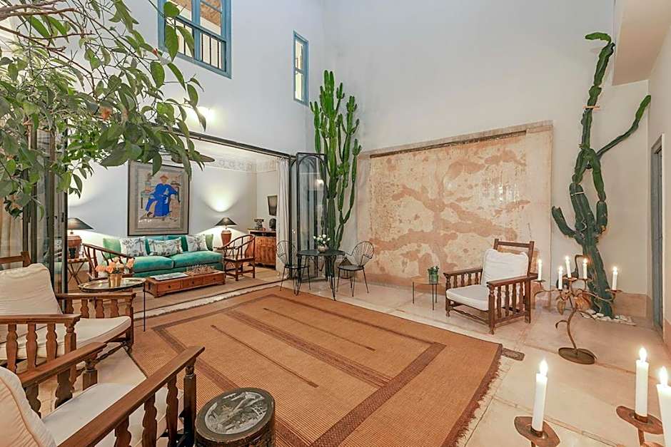 Riad Le J