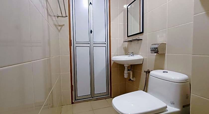 Capital O 90897 Island City Hotel