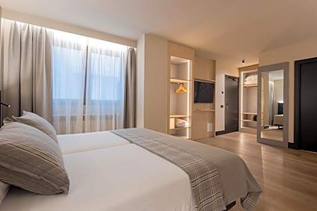 Quadruple Room (3 Adults + 1 Child)
