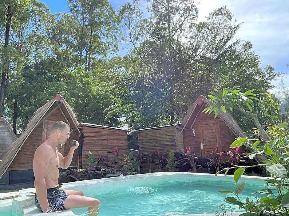 Triangular house and hot spring