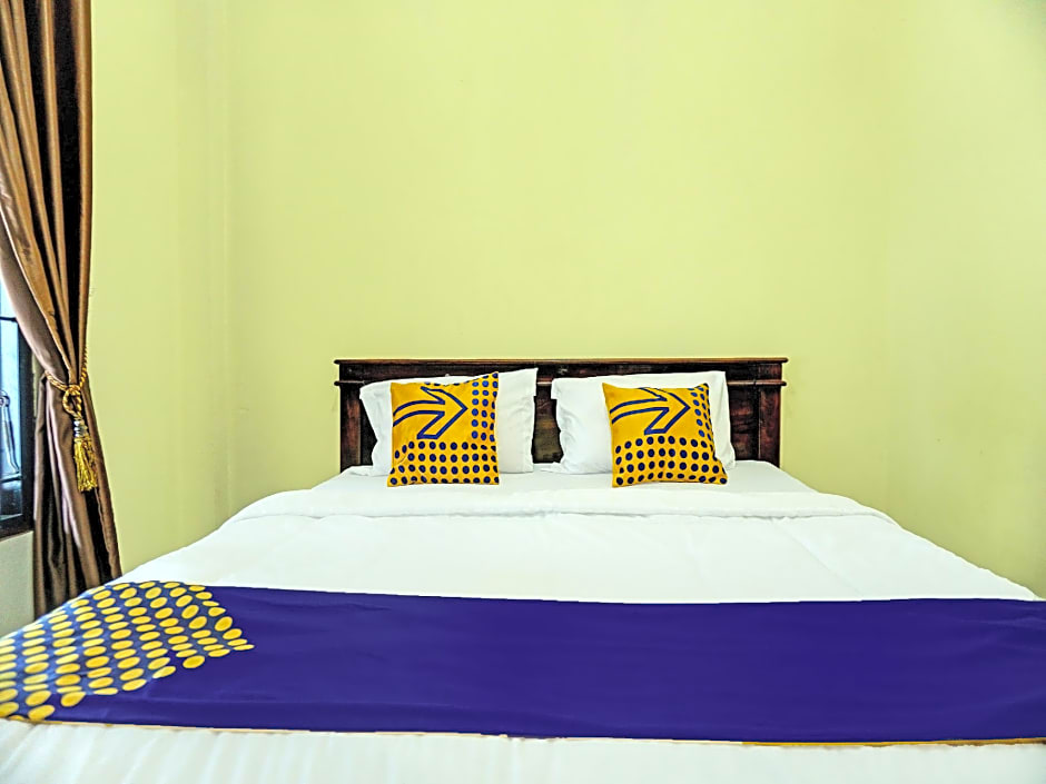 SPOT ON 92392 Penginapan Vinccent22 Syariah