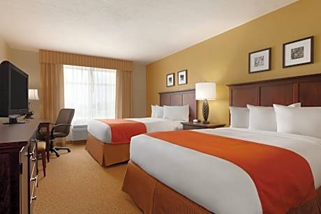 Deluxe Queen Suite with Two Queen Beds and Sofa Bed