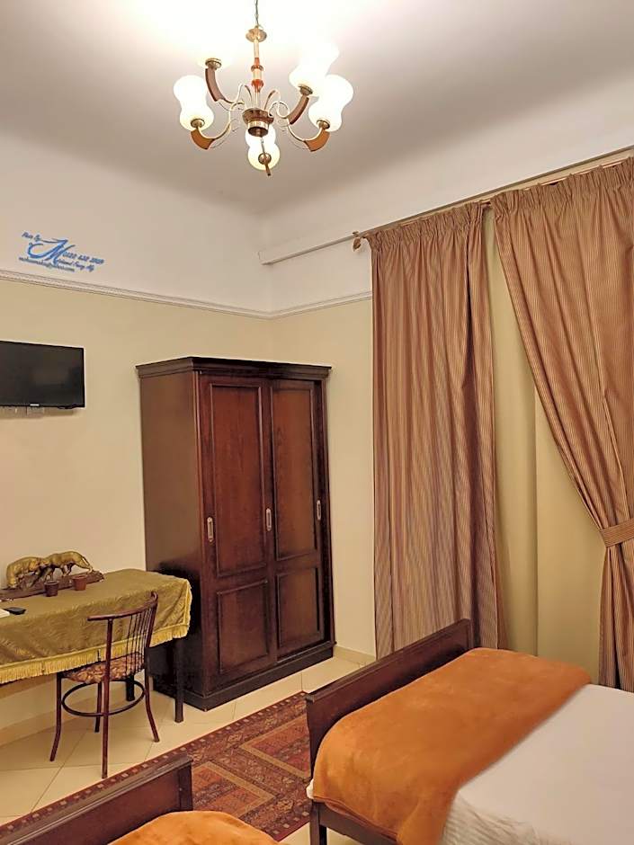 Triomphe Hostel