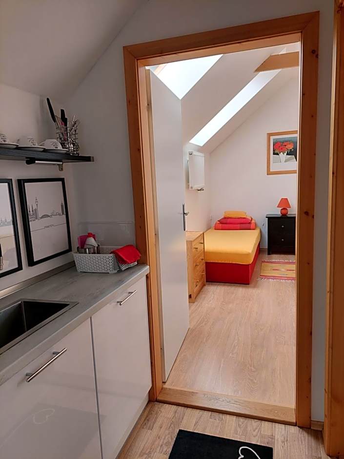 Dvoupokojový apartmán s kuchyňským koutem