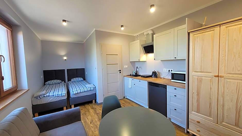 Wrzosowe Wzgórze 5 - Studia i Apartamenty