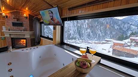 Junior Suite with Fire Place and Hot Tub - Waterfall View