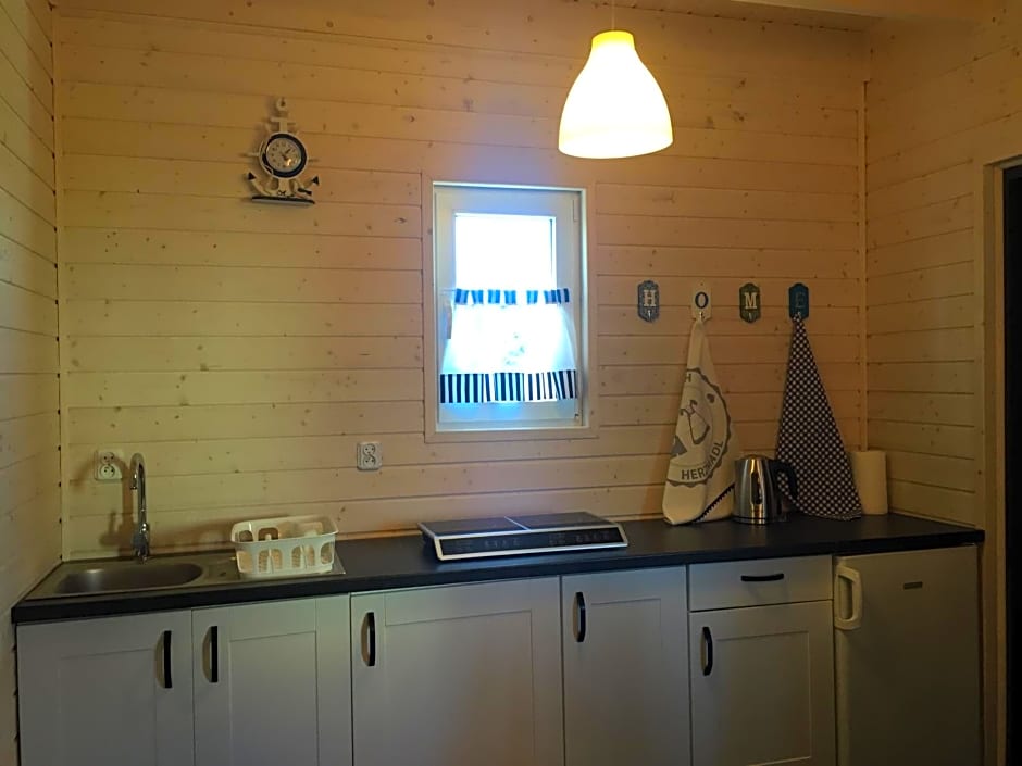 Domki Kapitańskie z prywatnym polem do gry w Mini Golf