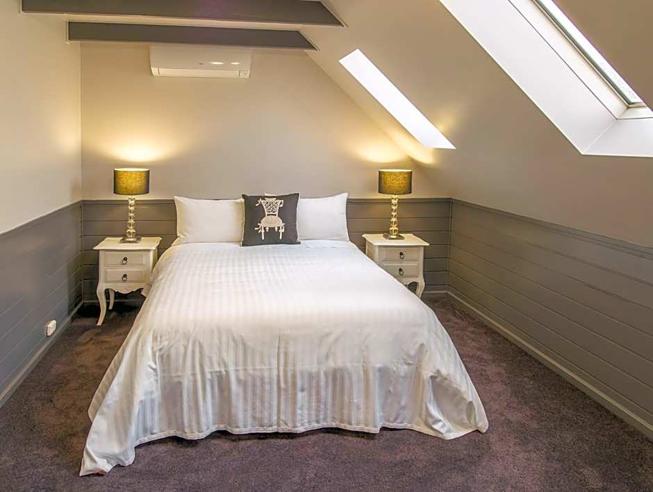 1 Queen Bed Suite — 4 fotoğraftan 1. fotoğraf