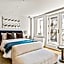 Luxe Studio with Charming Juliet Balcony