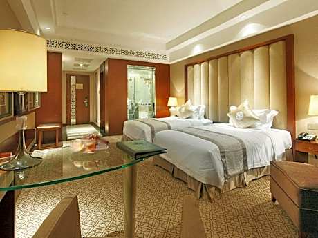 Enjoy a restful sleep in a garden view twin room