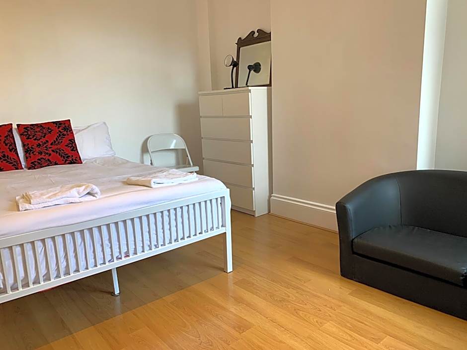 Photo 1 of 5 of Basic Triple Room with Shared Bathroom