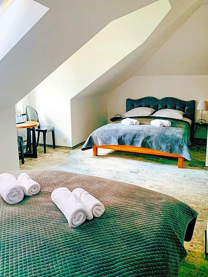 Photo 1 of 4 of Quadruple Room