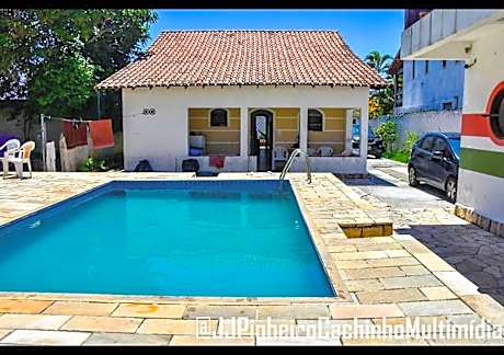 CASA 7 qts sendo 4 suites, Piscina Churrasqueira 200 m praia Anjos