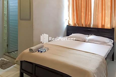 Aquino Marito Homestay Mitra RedDoorz