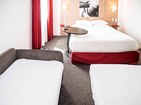 Standard Family Room with one double bed and twin beds (sofa)