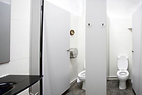 Bed in Dormitory with Shared Bathroom