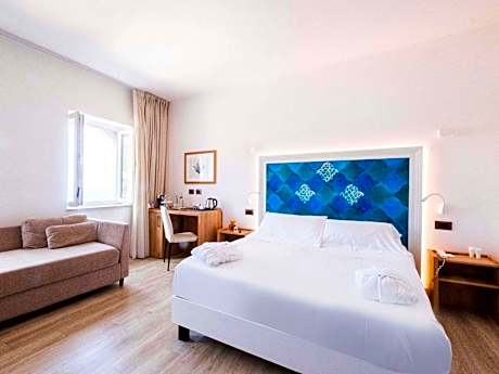 Deluxe Room with Queen Bed and Sofa Bed