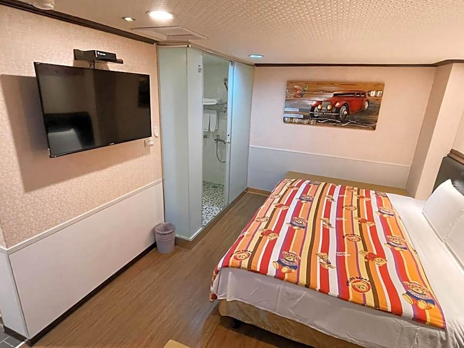 Photo 1 of 4 of Triple Room with Private Bathroom