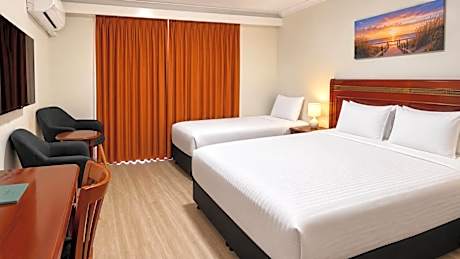 Twin Room with One Queen and One Single Bed