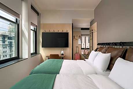 Queen Room with Two Queen Beds with Roll-In Shower and City View - Mobility Accessible