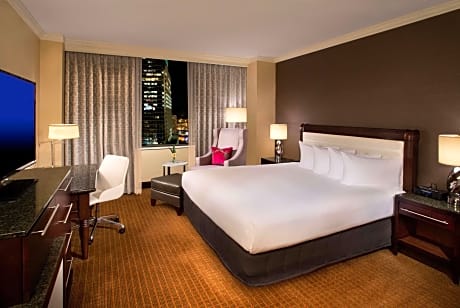 JUNIOR SUITE ONE KING BED, SERENITY BED LUX LINENS SPACIOUS LVNG AREA, 50-INCH HDTV MINI-FRIDGE WIFI ACCESS