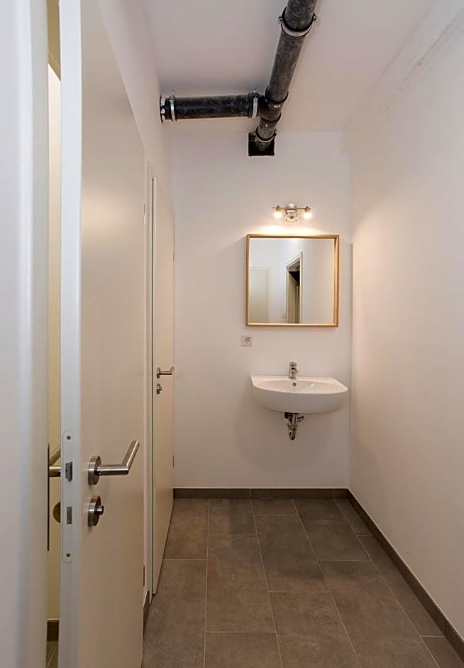 Zentral gelegene Zimmer mit Gemeinschaftsbad und Küche