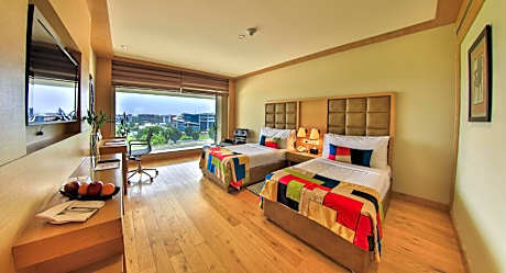Deluxe Twin Room with 10% discount on F&SB, SPA & Laundry,Happy Hours deal offering 1+1 offer. Offer is available from 6:00 PM till 8:00 PM at The Circle Bar
