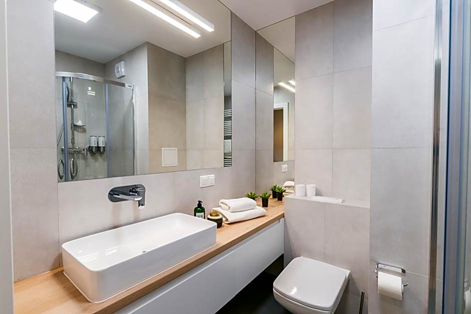 Q17 Apartments Rynek