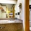 Three Rivers Executive Inn & Suites By OYO