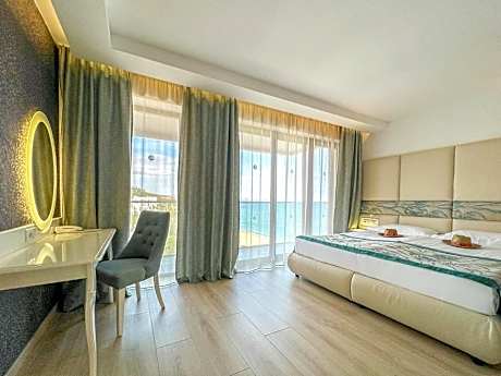 Junior Suite with Side Sea View – Premium A la cart & Exclusive Adults only Beach Access