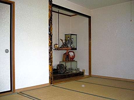 Japanese-Style Family Room with Shared Bathroom