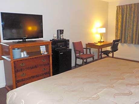 1 King Bed  Non-Smoking, Work Desk, Chair With Ottoman, Microwave And Refrigerator, Coffee Maker, Full Breakfast