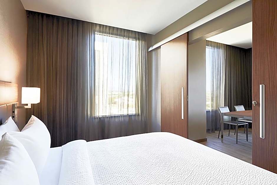 Photo 1 of 3 of 1 Bedroom 1 King Bed with Sofabed Suite, Hearing/Mobility Accessible, Bathtub, Courtyard View