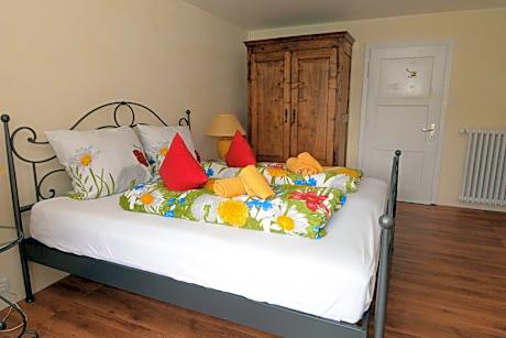 Queen Room with Shared Bathroom