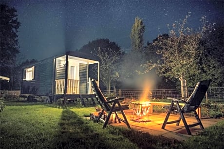 Pipowagen Elsebein Groningen Westerwolde unieke ligging met eigen tuin en vrij uitzicht over veld naar natuurgebied