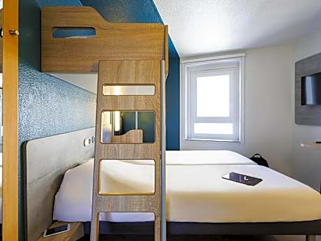 Triple Room with Two Single Beds and One Bunk Bed
