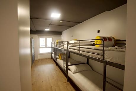 Bed in 8-Bed Dormitory Room with Private Bathroom