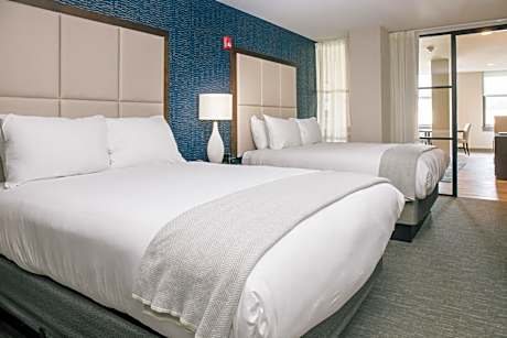 Deluxe Queen Suite with Two Queen Beds and Sofabed City View - Non Smoking