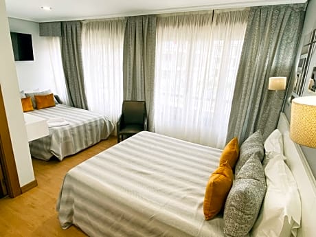 Triple Room (2 Adults + 1 Child)