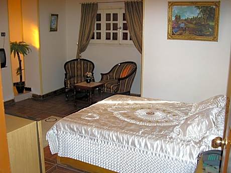 Economy Quadruple Room with Shared Bathroom