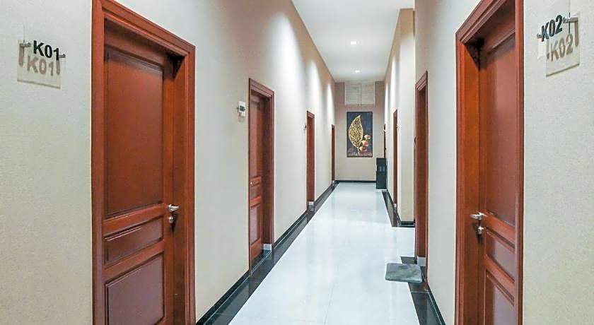 SUPER OYO Capital O 92066 Papakoel Hotel & Cafe