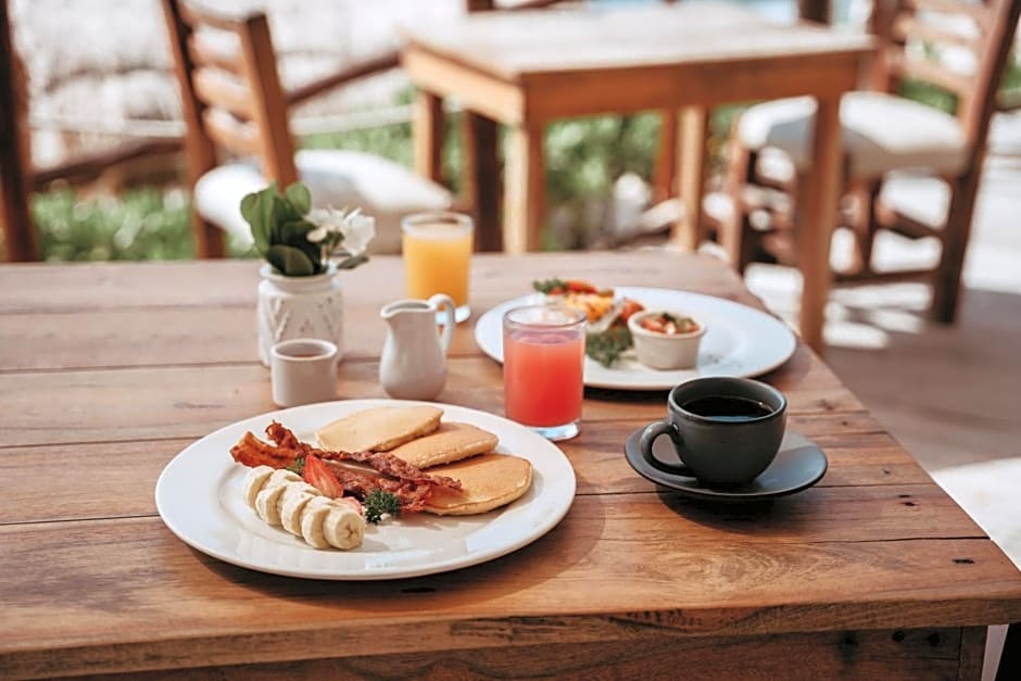 Petit Lafitte Beach Front Hotel & Bungalows