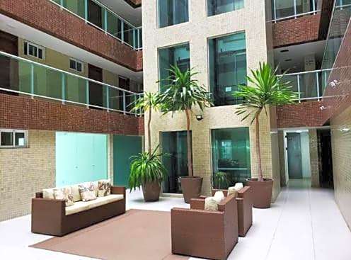 Confortável Flat com piscina de borda infinita na cobertura