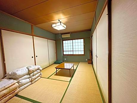 Japanese-Style Family Room with Shared Bathroom