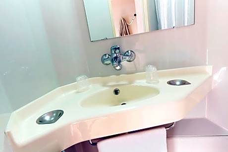 Triple Room (2 Single Beds + 1 Bunk Bed)