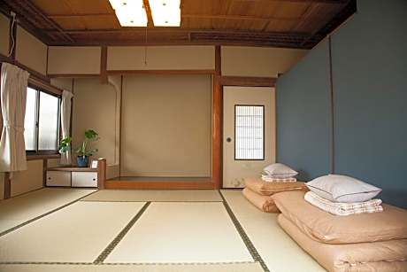Quadruple Room with Shared Bathroom