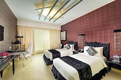 Zuri Club Room with Twin Beds with 01 way Airport transfer,10% Discount on Food and Soft Beverage