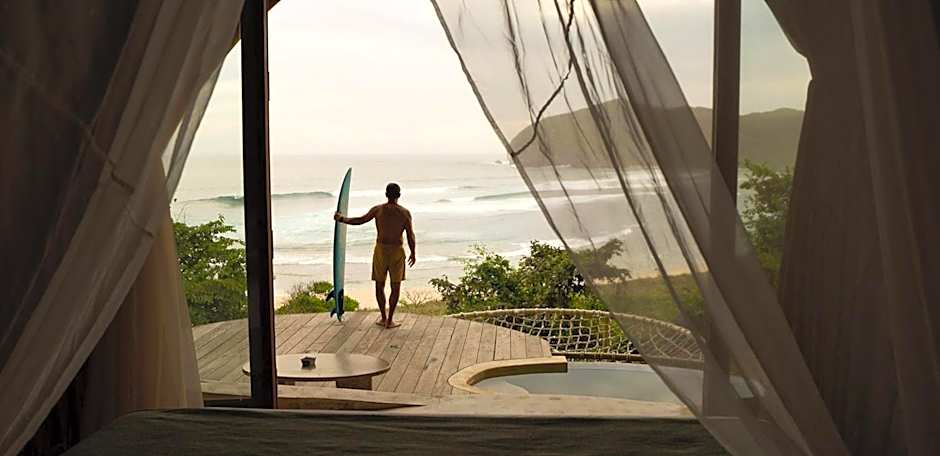 Kini Resort - Oceanfront Bamboo Eco Lodges