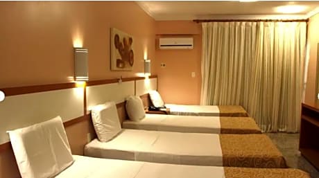 Standard Quadruple (01 Double Bed + 02 Singles)