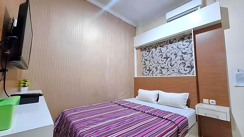 Tatti Inn Syariah Seturan RedPartner